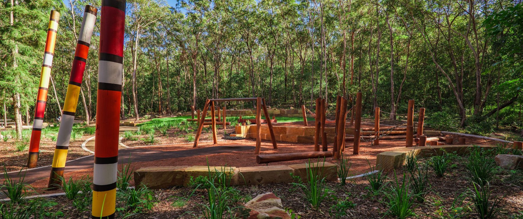 colourful poles and wooden playground equipment