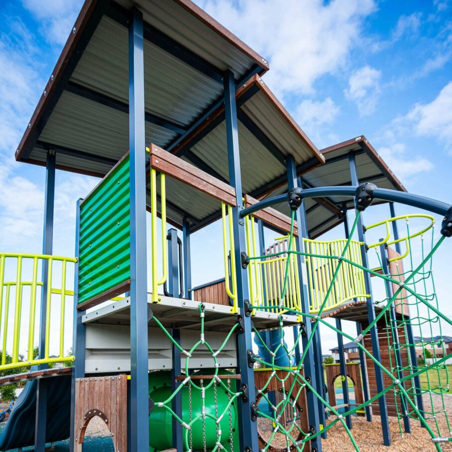 playground with green climbing ropes