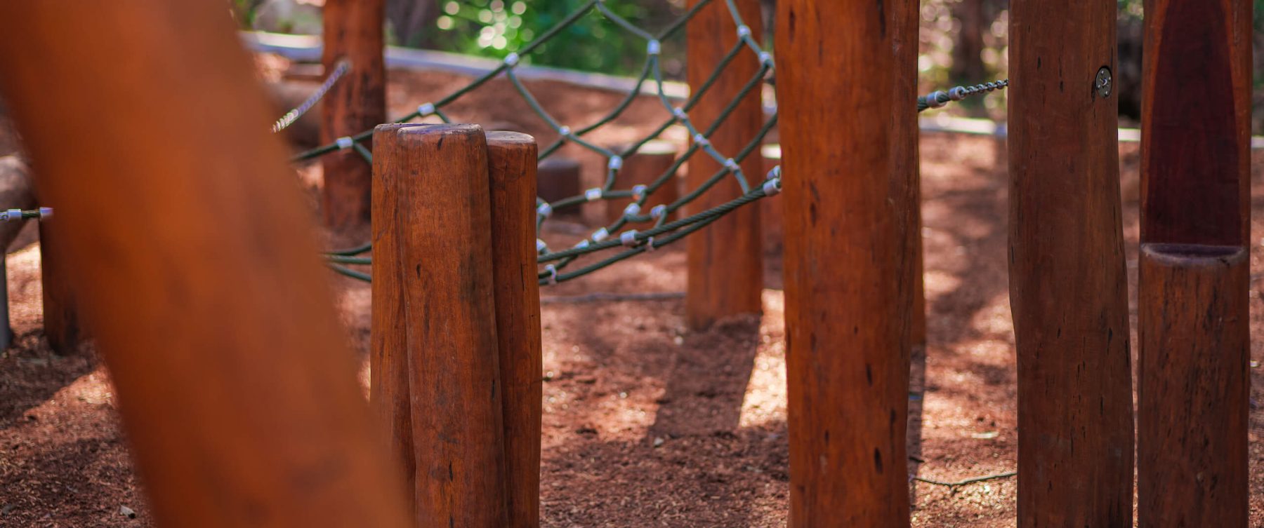 a close up shot of wood poles