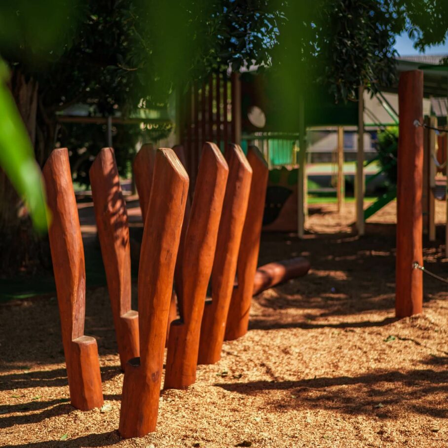 a row of diagonal wooden poles