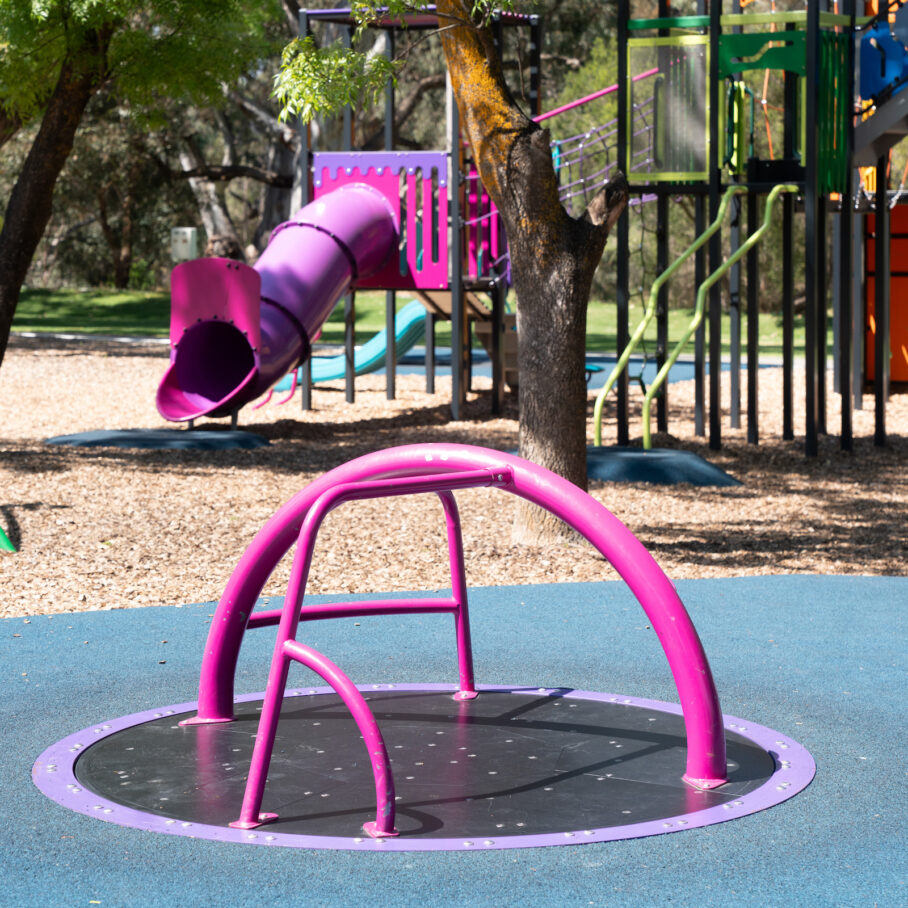 Pink climbing structure at playground